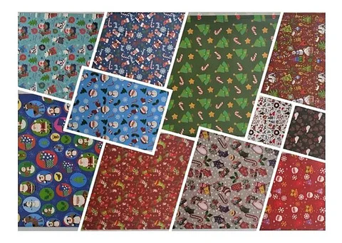 Pack 100 Pliegos Papel De Regalo Motivos Navideños 70x50 Cms