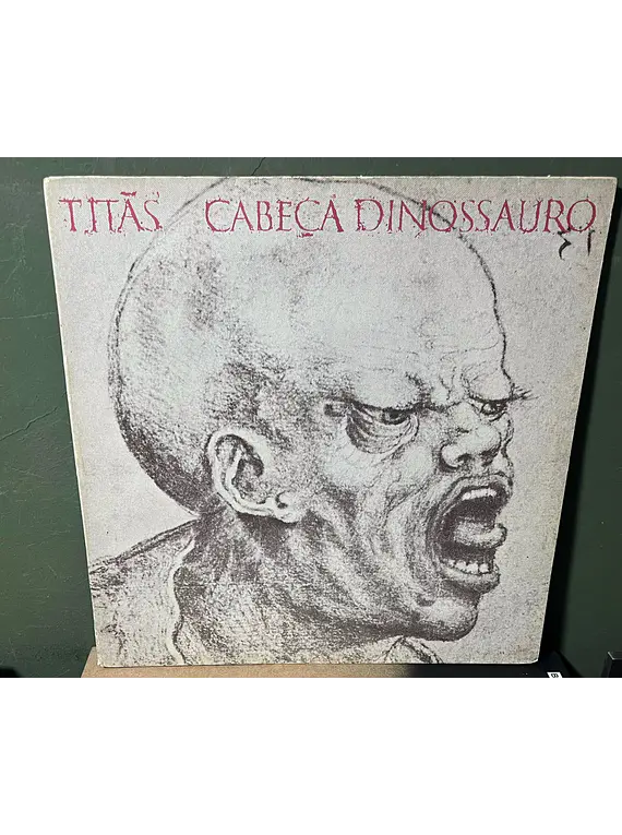 Titãs – Cabeça Dinossauro