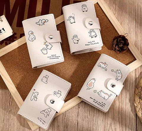 BINDER TARJETERO ECOCUERO "BEIGE ANIMALS"