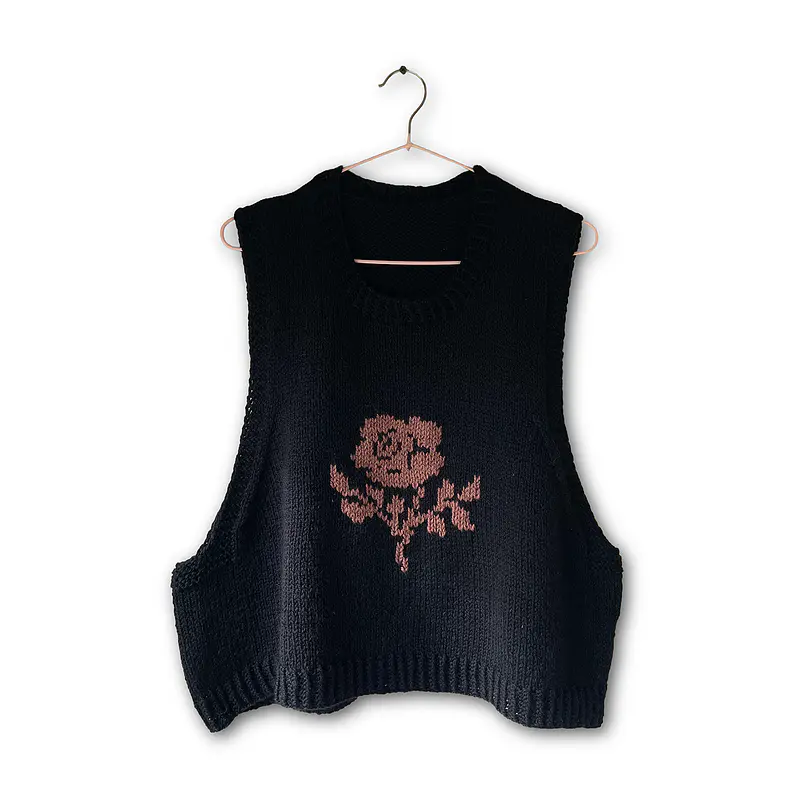chaleco negro y flor 100% lana merino
