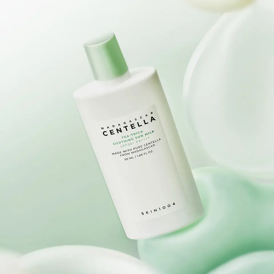 Madagascar Centella Tea-Trica Soothing Sun Milk (SKIN1004) - Protector solar ligero con árbol de té para pieles mixtas y grasas 1