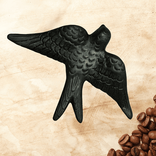 Handmade swallow made with recycled coffee
