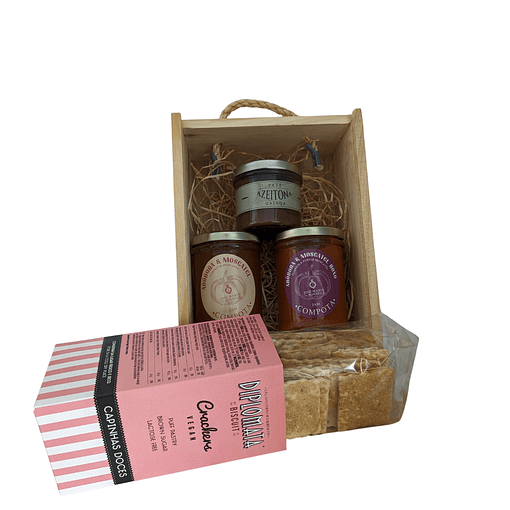 Special basket of patés, jams and gourmet crackers in wooden box