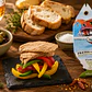 Tuna fillets with tricolor bell peppers and piri-piri in olive oil. - thumbnail 1