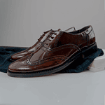 Zapatos hombre brogues en cuero charol y cordones encerados