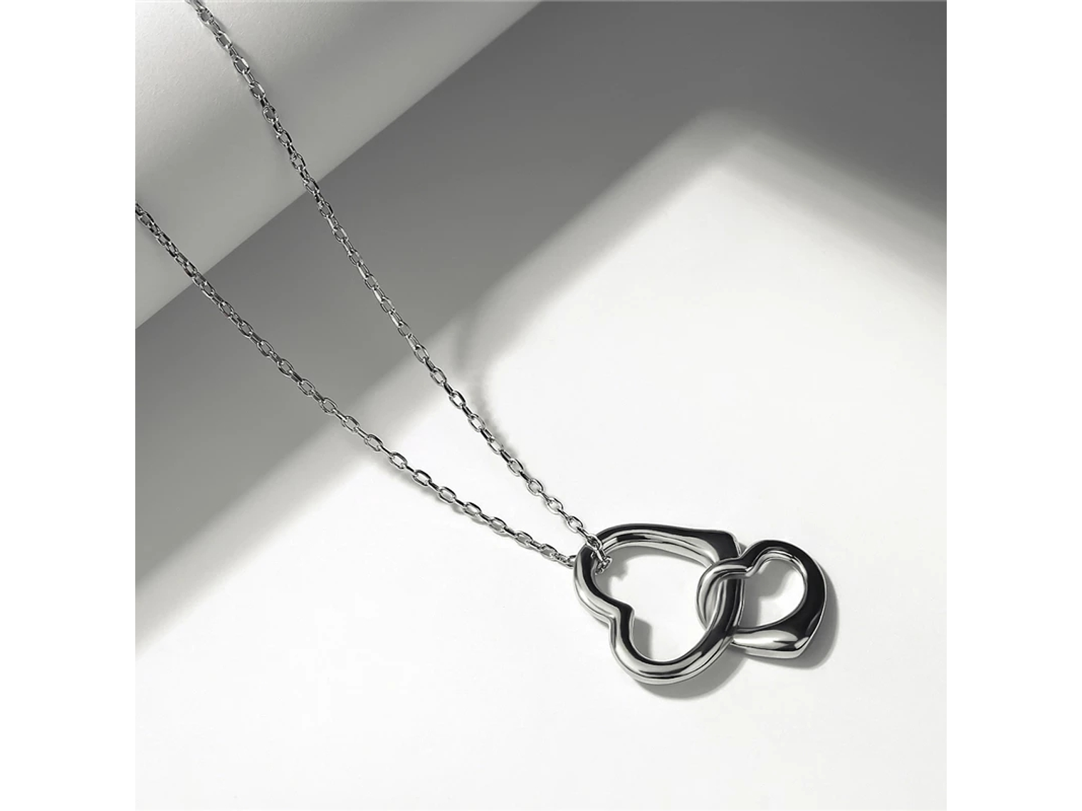 Collar Corazon Entrelazado Plateado 3