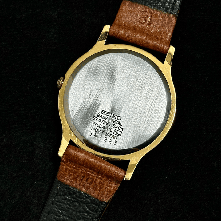 Seiko Quartz SQ – Black Dial Gold Tone – Quartz 37mm – V700-8A10 4