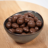 Pasas al ron cubiertas de chocolate  - 100 grs.