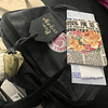 Tag de equipaje frase "Bon voyage" cuero negro letras plateadas