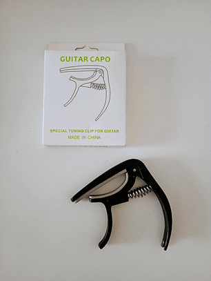 Capo traste guitarra