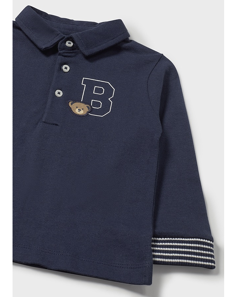 Polo m/comp. liso detalhes