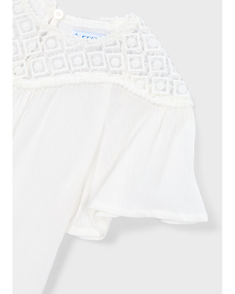 Blusa guipura combinada