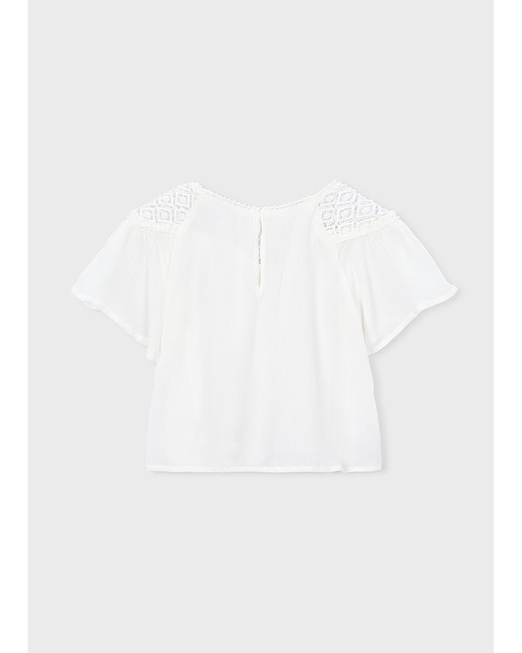 Blusa guipura combinada