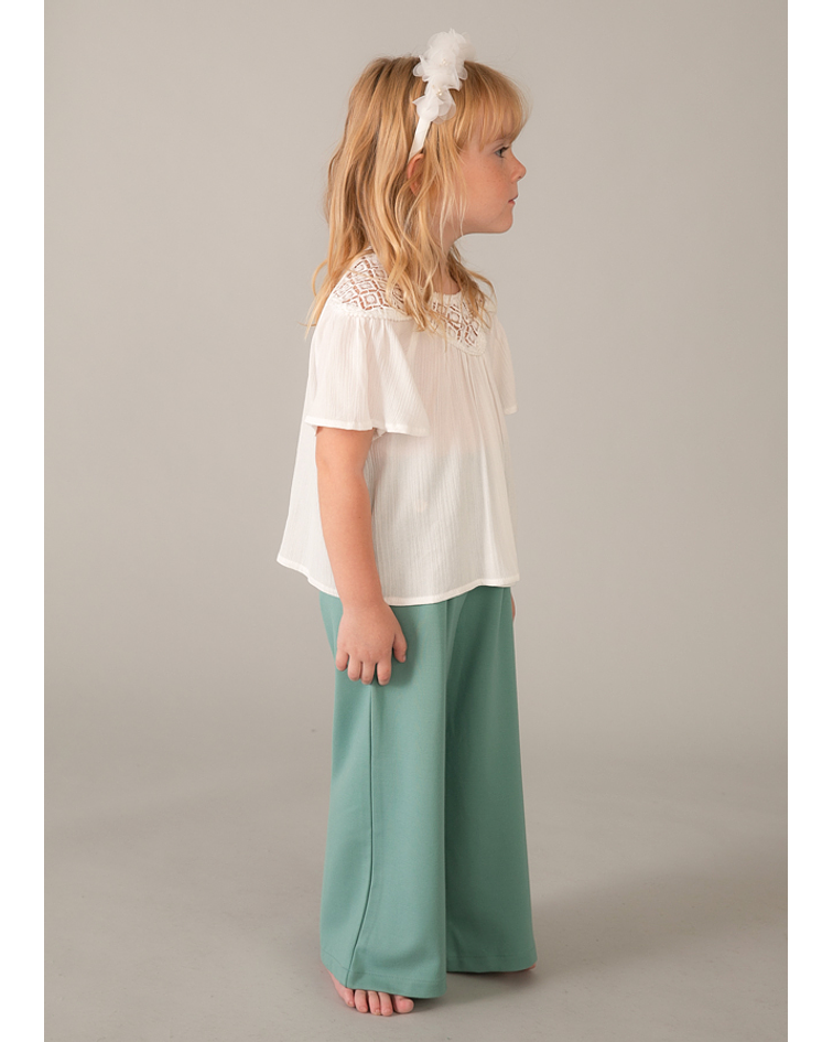 Blusa guipura combinada