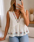 CAMISA COM BORDADOS FLORAIS