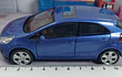 Kia Rio Pride azul Escala 1:36 welly