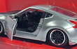 Nissan 370z ESCALA 1/32 ,MARCA JADA . Rapido y furioso 