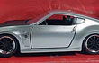 Nissan 370z ESCALA 1/32 ,MARCA JADA . Rapido y furioso 