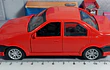 Renault Logan rojo escala 1/36  