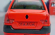 Renault Logan rojo escala 1/36  
