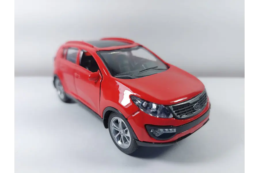 Kia sportage Rojo Escala 1/36 con luces LED