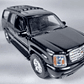 Cadillac Escalade 2002 negro Escala 1/36 marca welly - Miniatura 1
