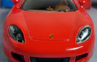 Porsche CARRERA GT rojo Escala 1:36 marca kinsmart 