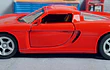 Porsche CARRERA GT rojo Escala 1:36 marca kinsmart 