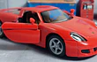 Porsche CARRERA GT rojo Escala 1:36 marca kinsmart 