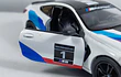 BMW M8 COMPETICION ﻿blanco Marca KINSMART ESCALA 1/36