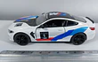 BMW M8 COMPETICION ﻿blanco Marca KINSMART ESCALA 1/36