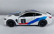 BMW M8 COMPETICION ﻿blanco Marca KINSMART ESCALA 1/36