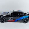 BMW M8 COMPETICION ﻿negro Marca KINSMART ESCALA 1/36