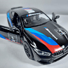 BMW M8 COMPETICION ﻿negro Marca KINSMART ESCALA 1/36