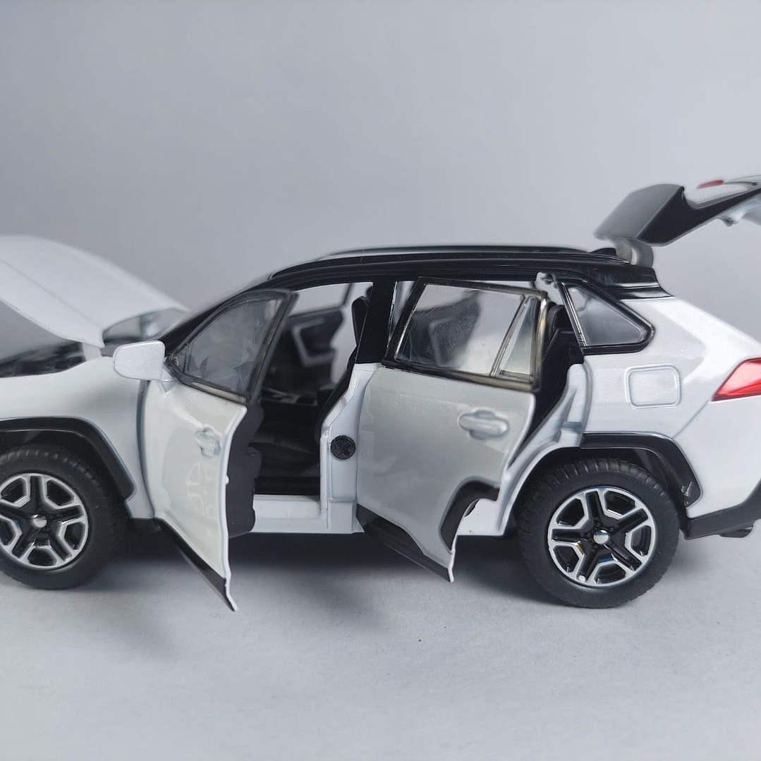 TOYOTA RAV4 blanca  ,ESCALA 1:32  MARCA DOUBLE HORSES  7
