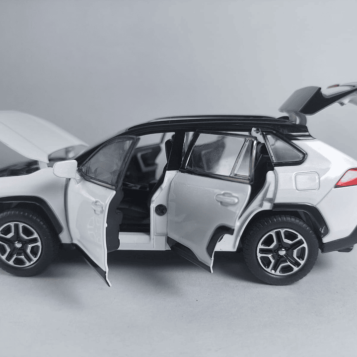 TOYOTA RAV4 blanca  ,ESCALA 1:32  MARCA DOUBLE HORSES  7