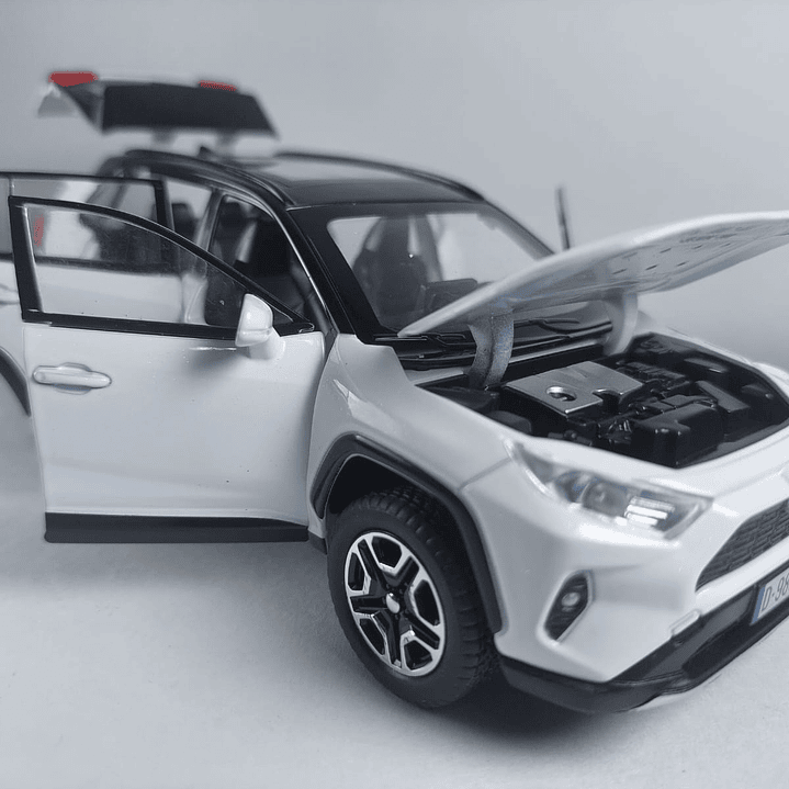 TOYOTA RAV4 blanca  ,ESCALA 1:32  MARCA DOUBLE HORSES  8