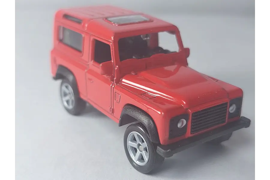 LAND ROVER DEFENDER ROJO , MARCA Welly, Escala 1-64