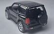 MITSUBISHI MONTERO NEGRO, MARCA Welly, Escala 1-64