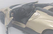 BUGATTI MISTRAL DORADO ESCALA 1/36 ,MARCA KINSMART﻿