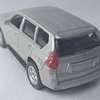 TOYOTA PRADO DORADA MARCA WELLY, ESCALA 1/64