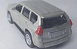 TOYOTA PRADO DORADA MARCA WELLY, ESCALA 1/64