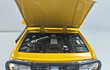 TOYOTA LC80, MARCA CHINA ESCALA 1/24 AMARILLA