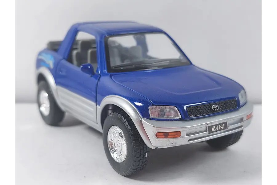 Toyota rav4 cabriolet Escala 1/32 MARCA KINSMART 