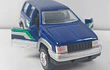 Jeep Cherokee azul ,Escala 1/36 marca china