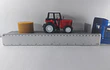 Mula Freightliner Cascadia cama baja y tractor 1/43 azul, new ray