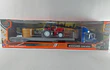 Mula Freightliner Cascadia cama baja y tractor 1/43 azul, new ray