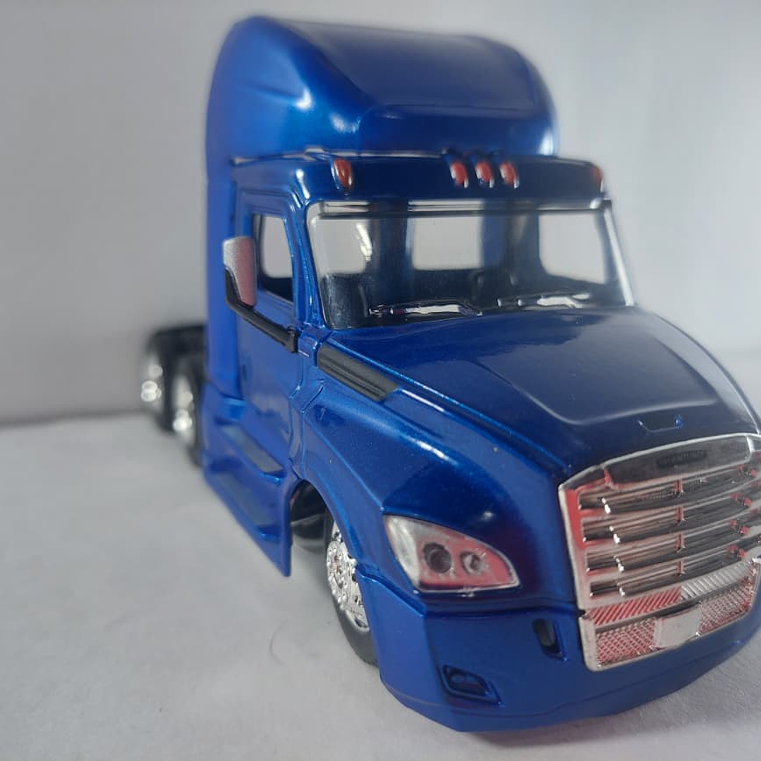 Mula Freightliner Cascadia cama baja y tractor 1/43 azul, new ray 8