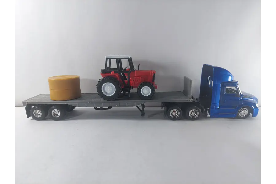 Mula Freightliner Cascadia cama baja y tractor 1/43 azul, new ray