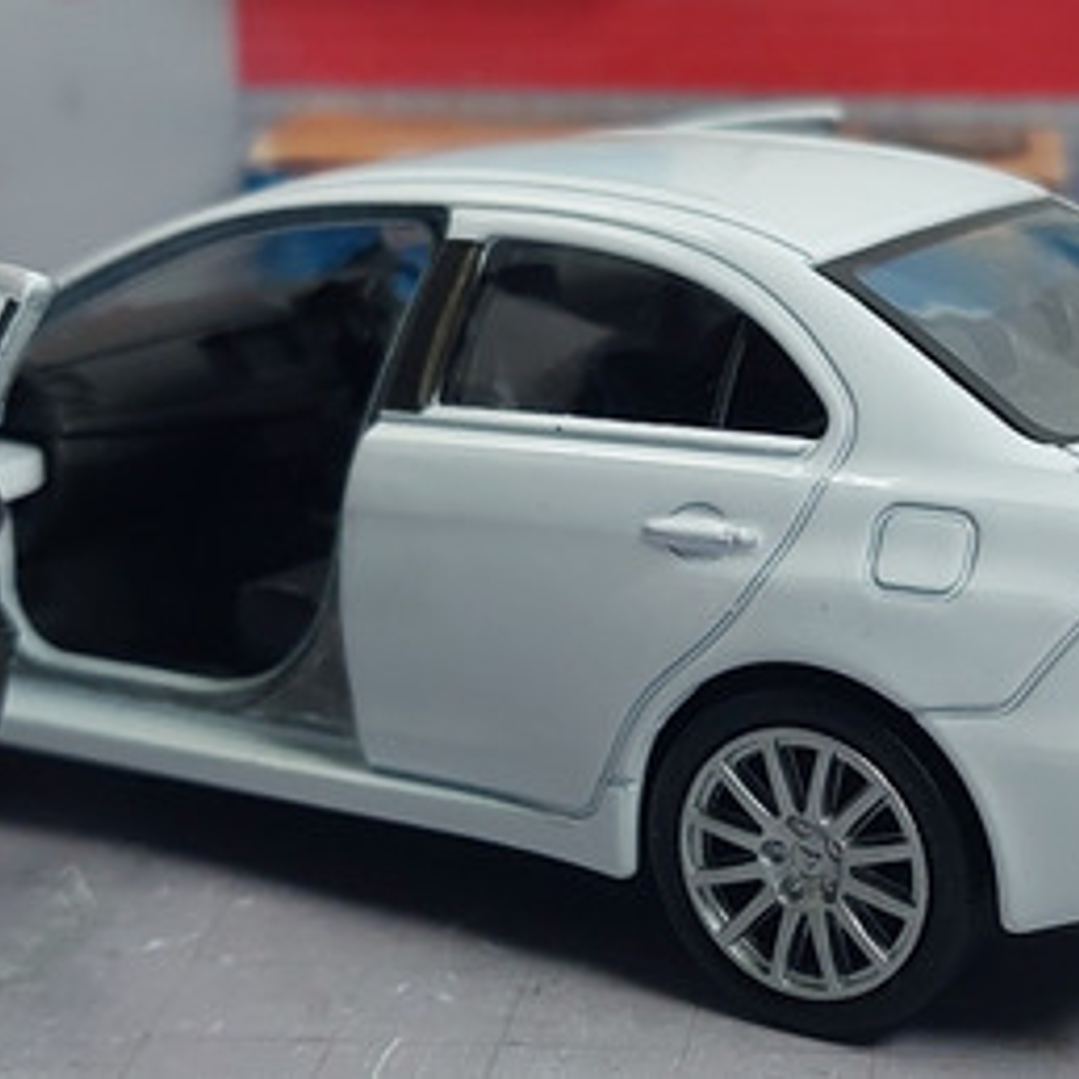Mitsubishi Lancer Evolution X blanco 1/36, Kinsmart 4